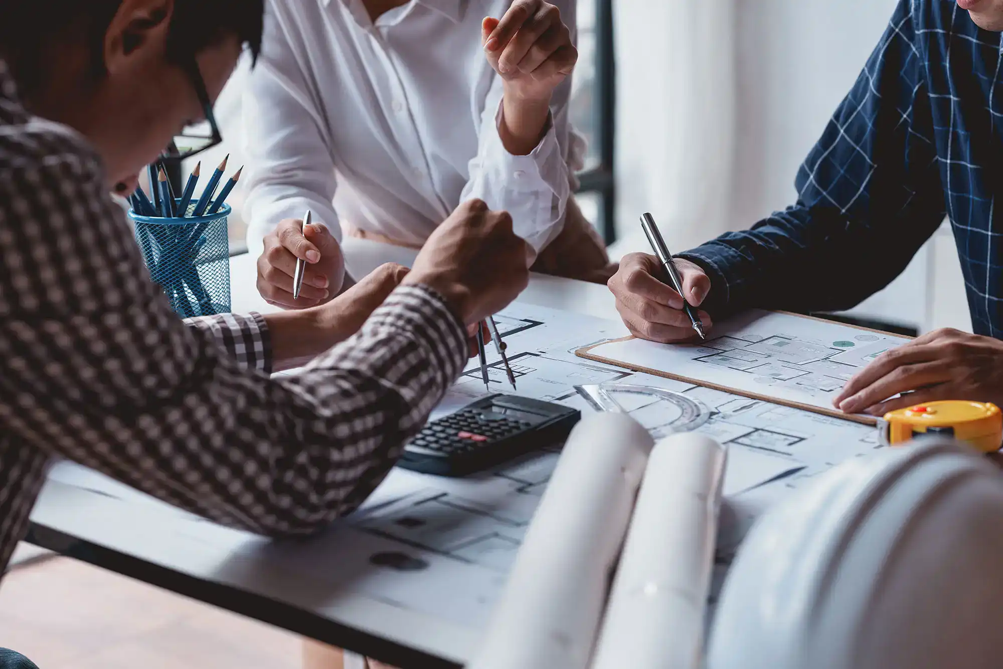 Professionals working on home plans