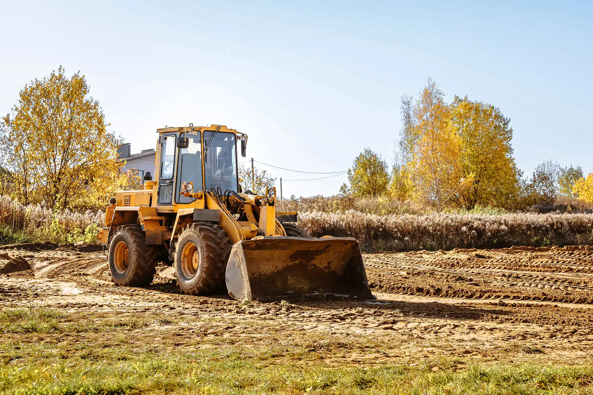 Bulldozer grading a new community